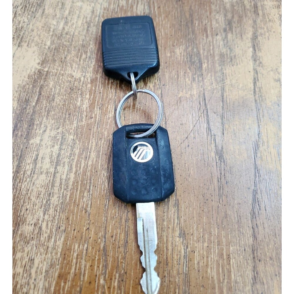 OEM Mercury 4-Button Remote Head Key Fob FCC ID CWTWB1U331  Cut Blade